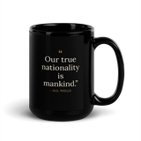 Black mug, handle on the right: "Our true nationality is mankind." H. G. Wells.