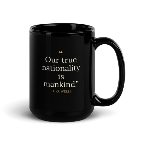 We Are Mankind Mug — H.G. Wells — stacked quote, gold attribution — black gloss ceramic — front