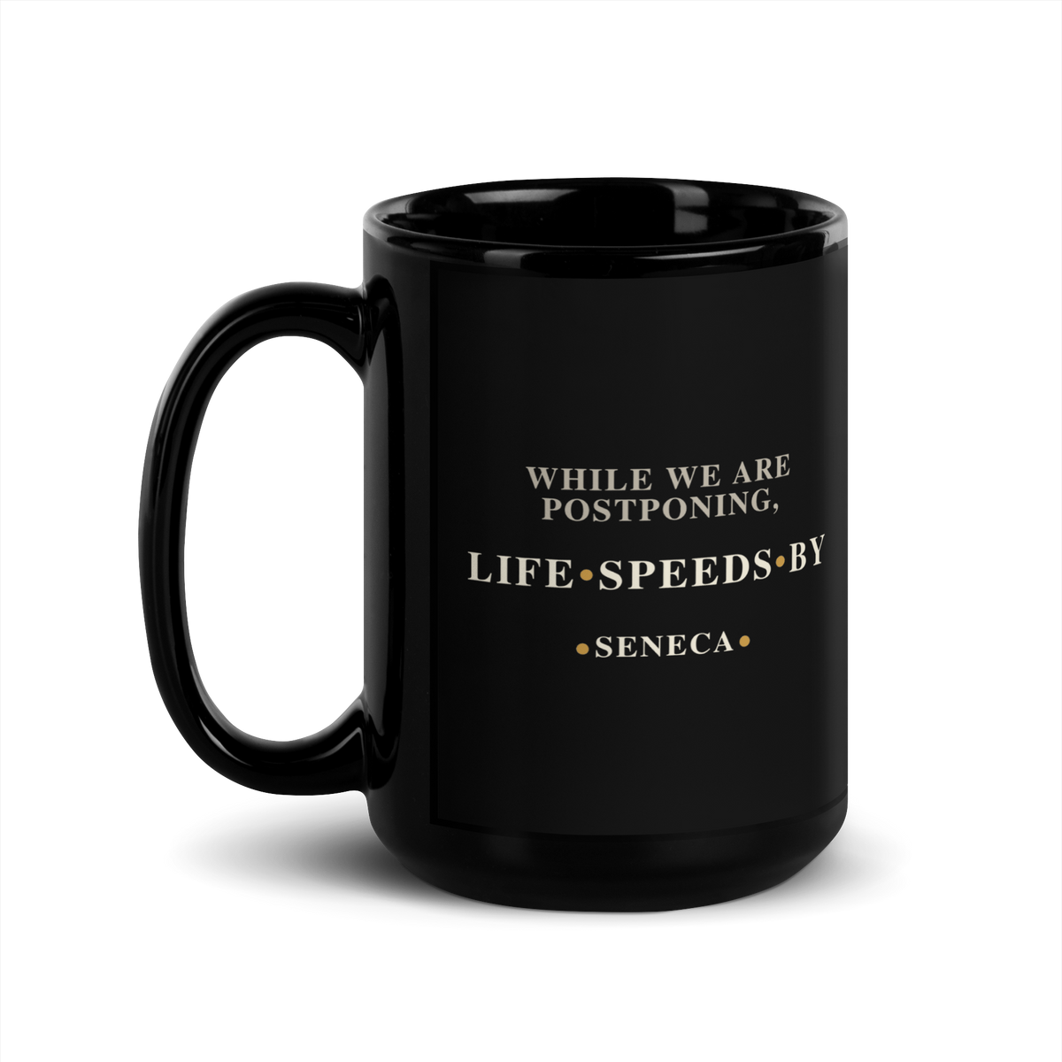 Black mug, handle on the left, showing the same Seneca line from Letter I.