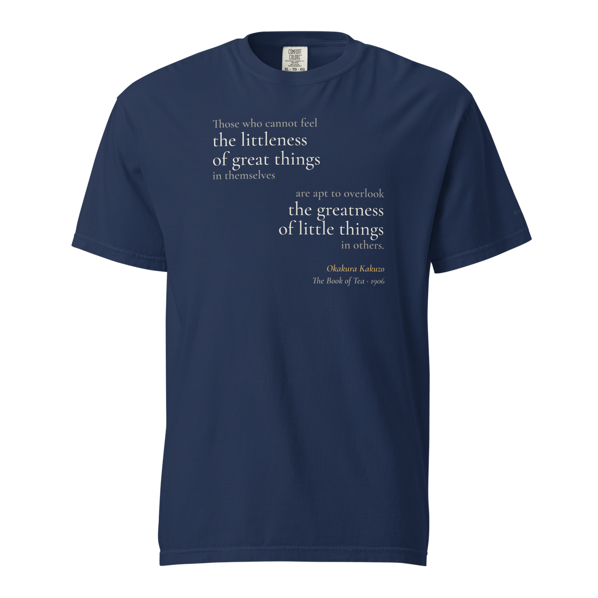 Navy t-shirt, front: Okakura's line on "the littleness of great things" and "the greatness of little things," mirrored.
