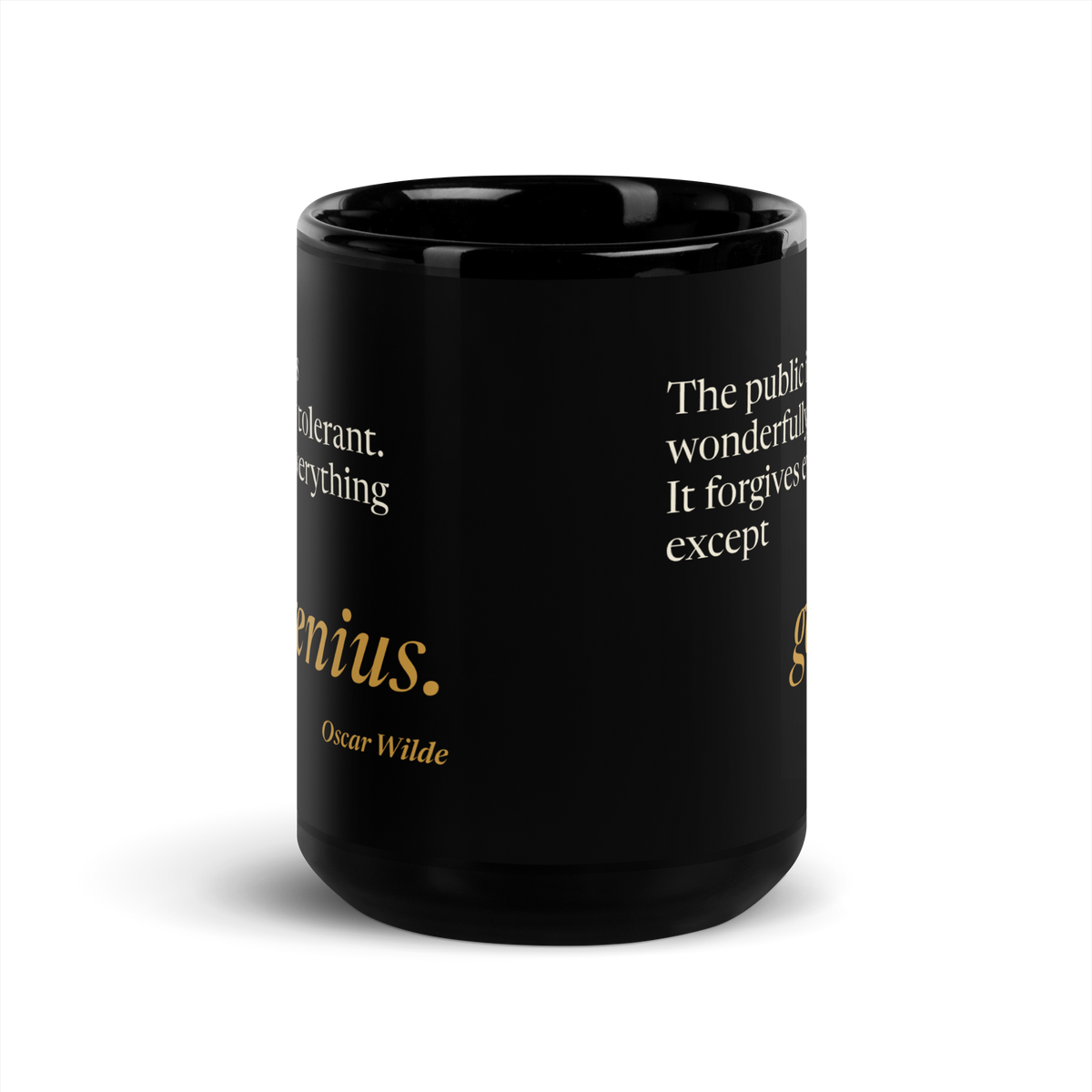 Black mug, front: the Wilde quote printed on both sides, “genius.” in warm matte gold.
