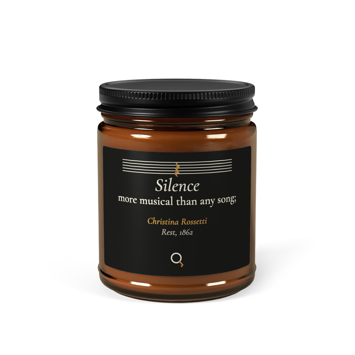 Amber candle jar, front: “Silence more musical than any song;” Christina Rossetti, under a staff with a quarter rest.