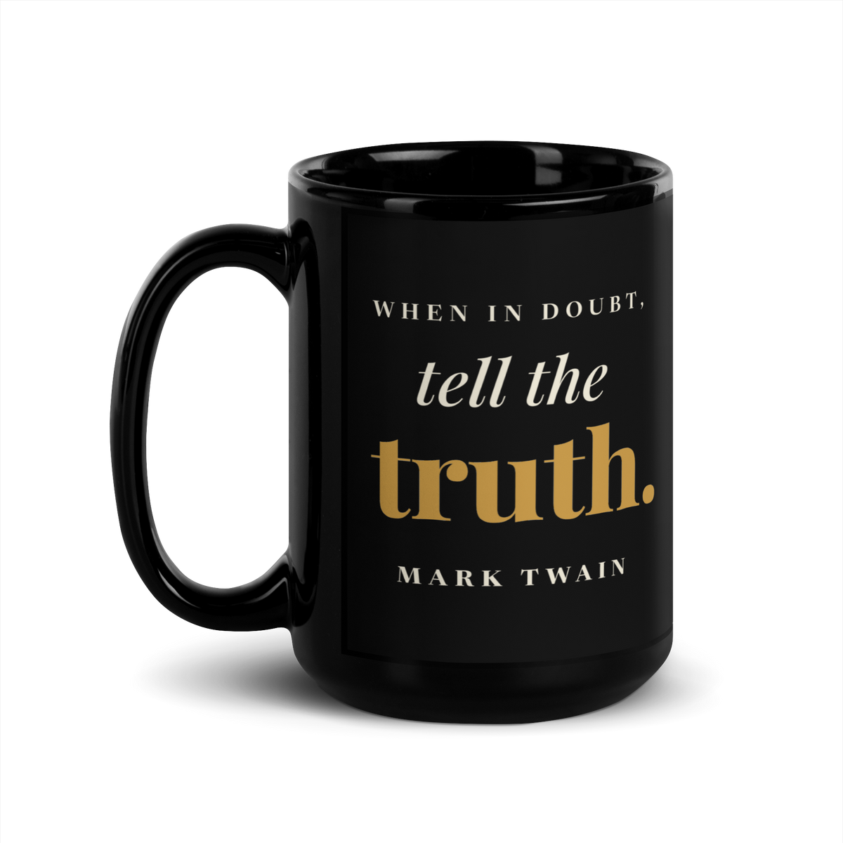 Black mug, handle on the left, showing the same Mark Twain line from Following the Equator.