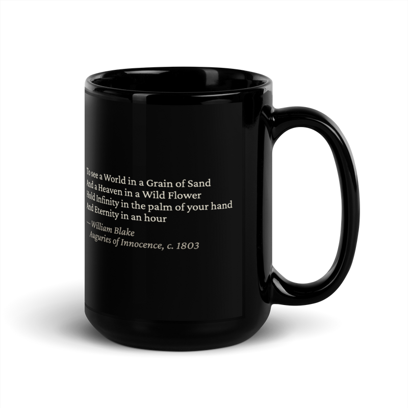 Black mug, handle on the right: “To see a World in a Grain of Sand…” William Blake.