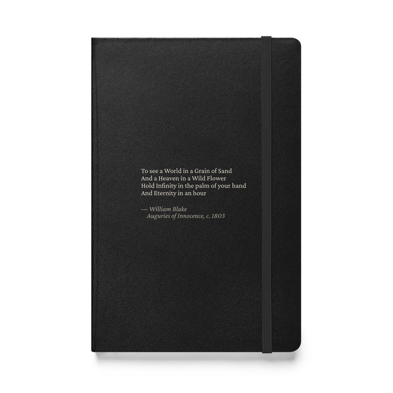 Black hardcover journal, front: “To see a World in a Grain of Sand…” William Blake.