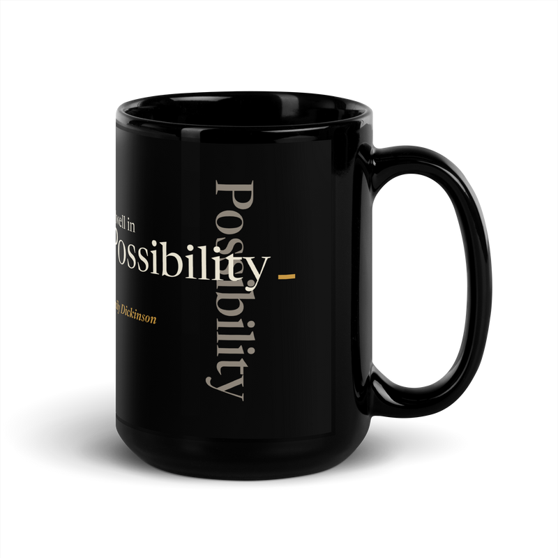 Black mug, handle on the right: "I dwell in Possibility —" Emily Dickinson, Possibility running across and down.