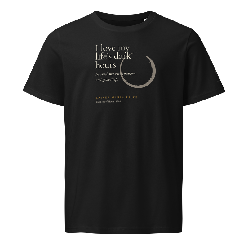 Black organic t-shirt, front: “I love my life’s dark hours…” Rainer Maria Rilke, beside a pewter ensō.