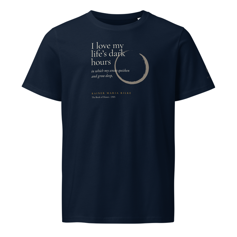 Navy organic t-shirt, front: “I love my life’s dark hours…” Rainer Maria Rilke, beside a pewter ensō.