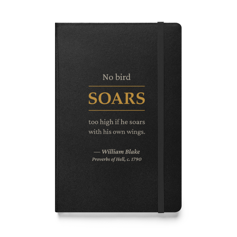 Black hardcover journal, front: “No bird soars too high if he soars with his own wings.” Blake, SOARS in warm matte gold.
