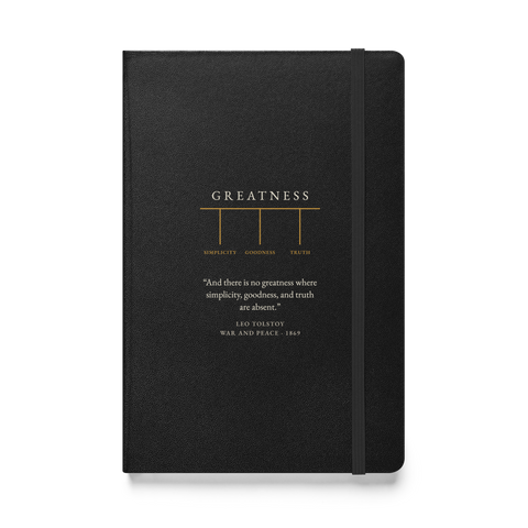 Black hardcover journal: GREATNESS over three columns — SIMPLICITY, GOODNESS, TRUTH — with Tolstoy's War and Peace quote