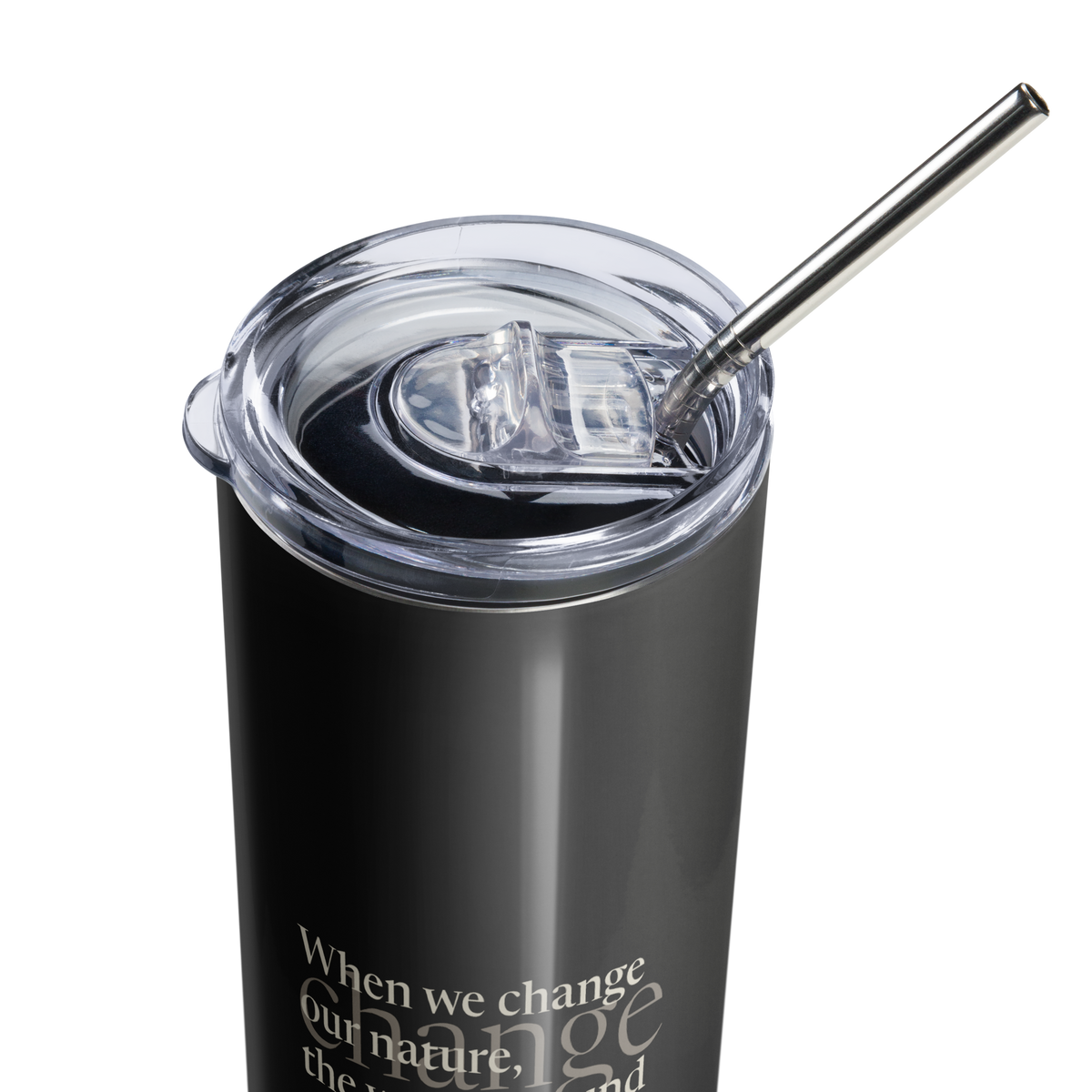 Black tumbler, close-up of the clear lid and steel straw above the Gandhi quote.
