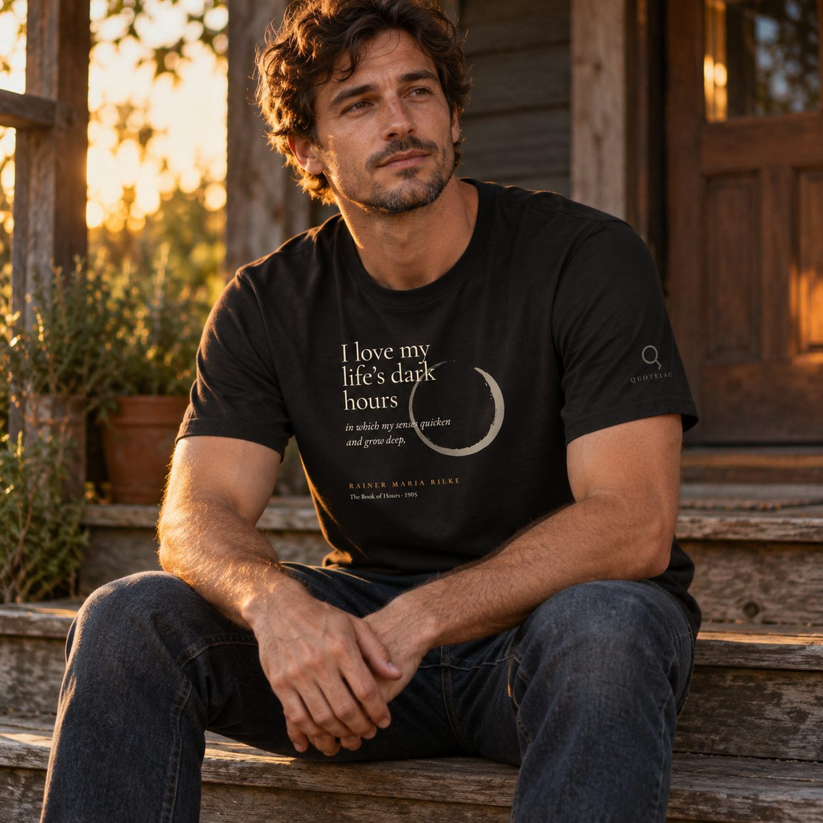 Person on a porch wearing the My Life's Dark Hours Rilke tee.