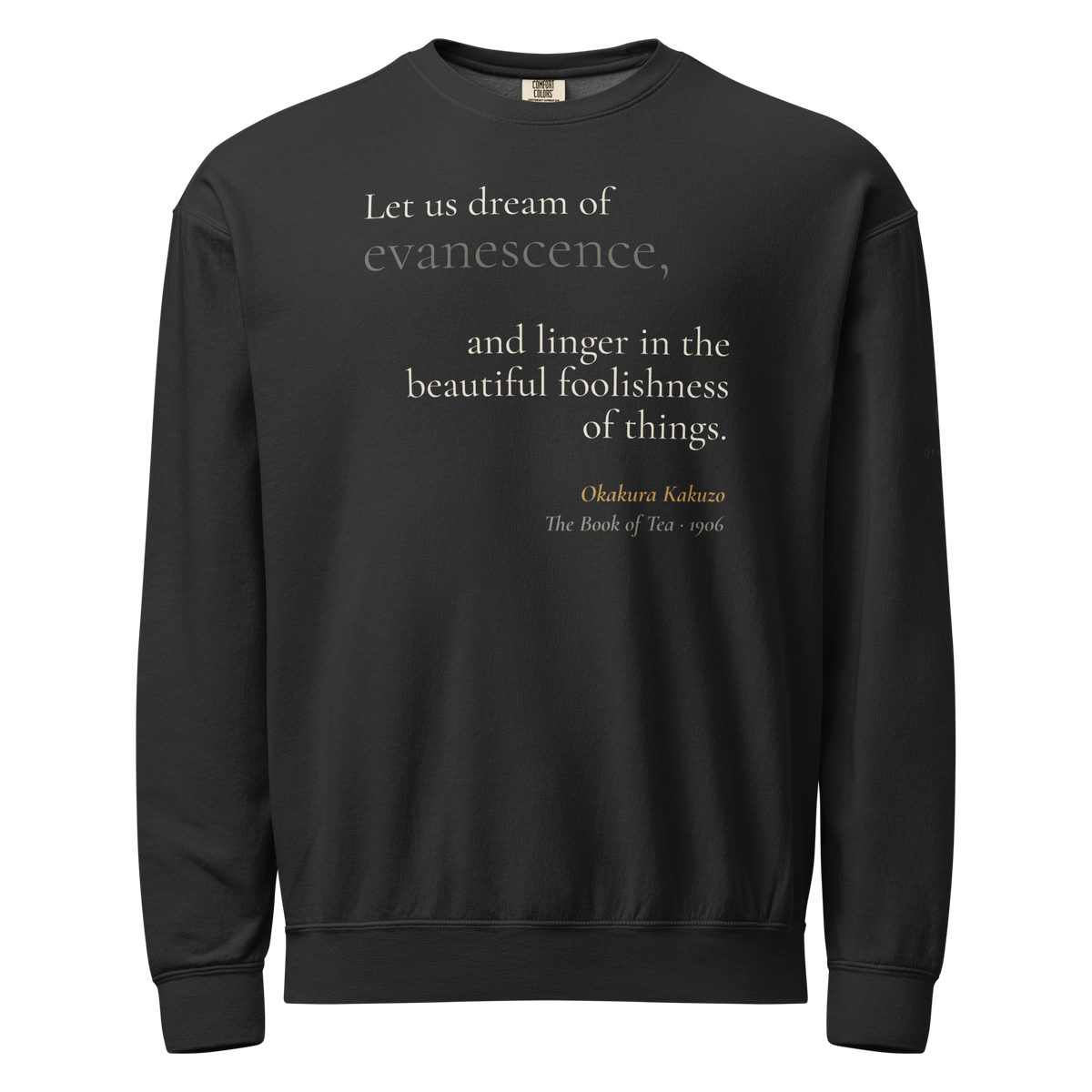 Black fleece sweatshirt, front: “let us dream of evanescence,” the big word faint, from Okakura’s The Book of Tea.