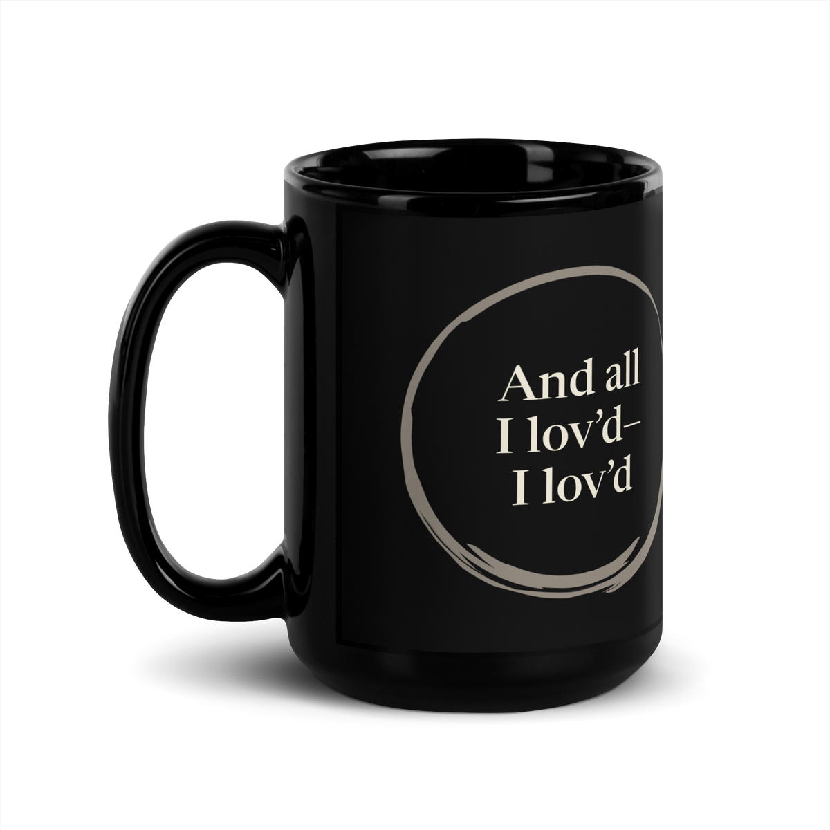 Black mug, ensō side: “And all I lov’d— I lov’d” inside an open circle. Turn it to read “alone—”.