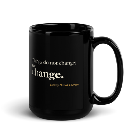 Black mug, handle on the right: “Things do not change; we change.” Henry David Thoreau.