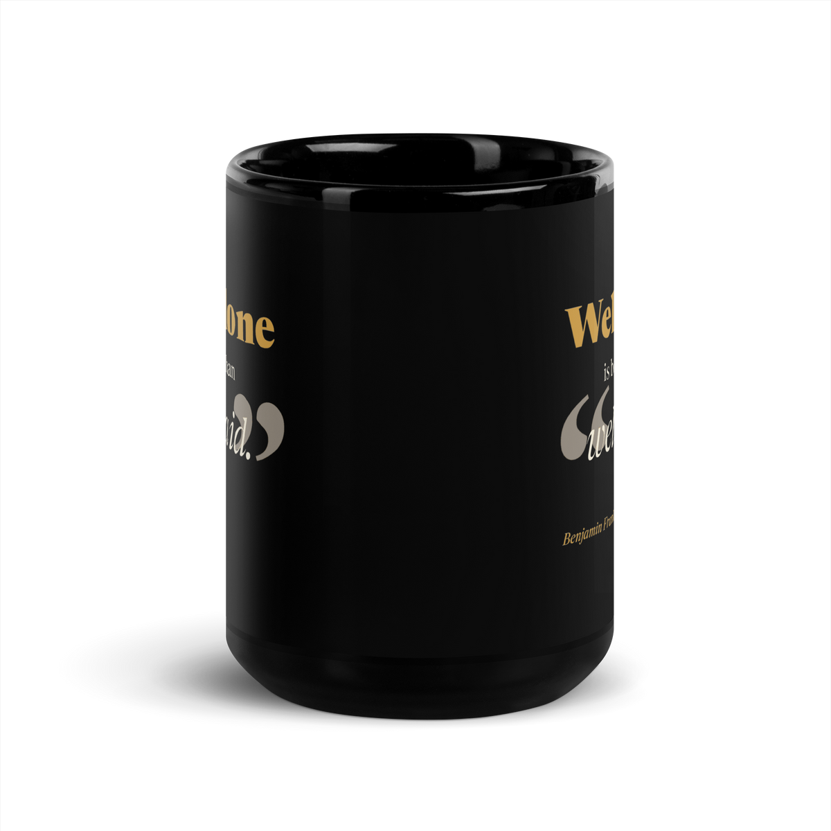 Black 15 oz mug, handle turned away: the Franklin quote curving around the edge of the mug.